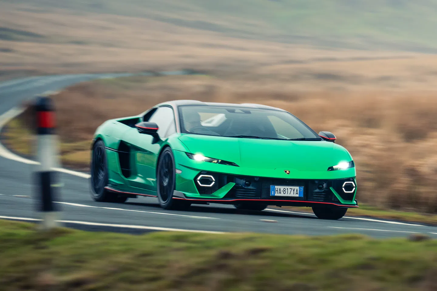 Lamborghini Temerario: Hybrid Power Meets Supercar Drama 6 Green Lamborghini racing on winding road